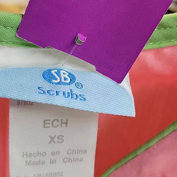 Bundle of 4 pc. scrubs: SB, & UA, & Cherokee bottoms, size XS. - Picture 4 of 15